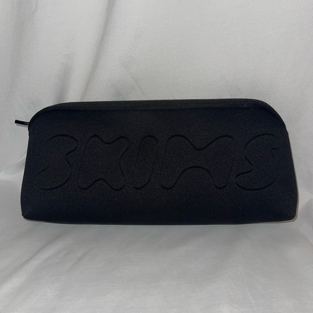 Skims black zipper clutch